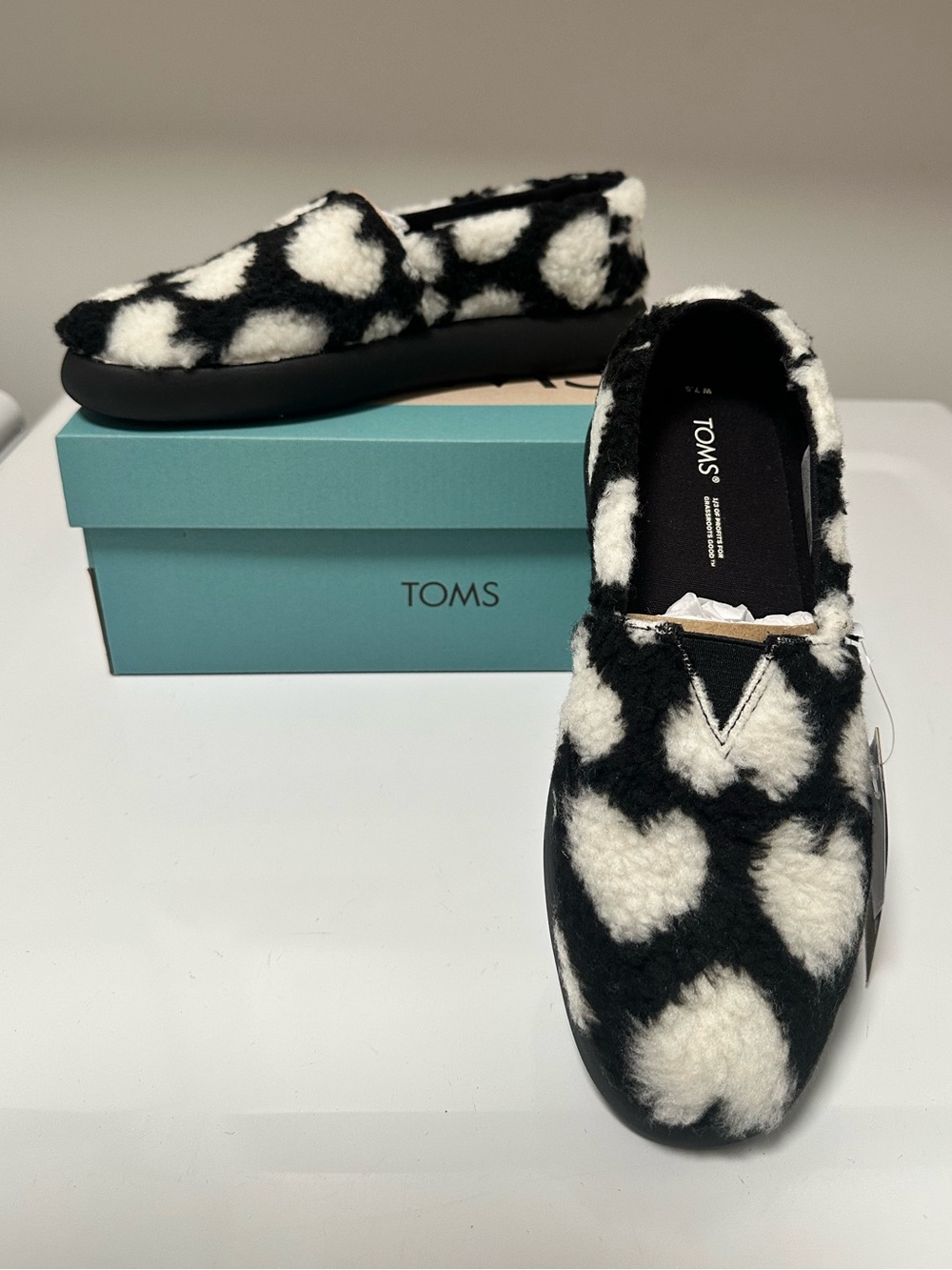 TOMS Black and White Sherpa Heart Slip-On Moccasins for Women